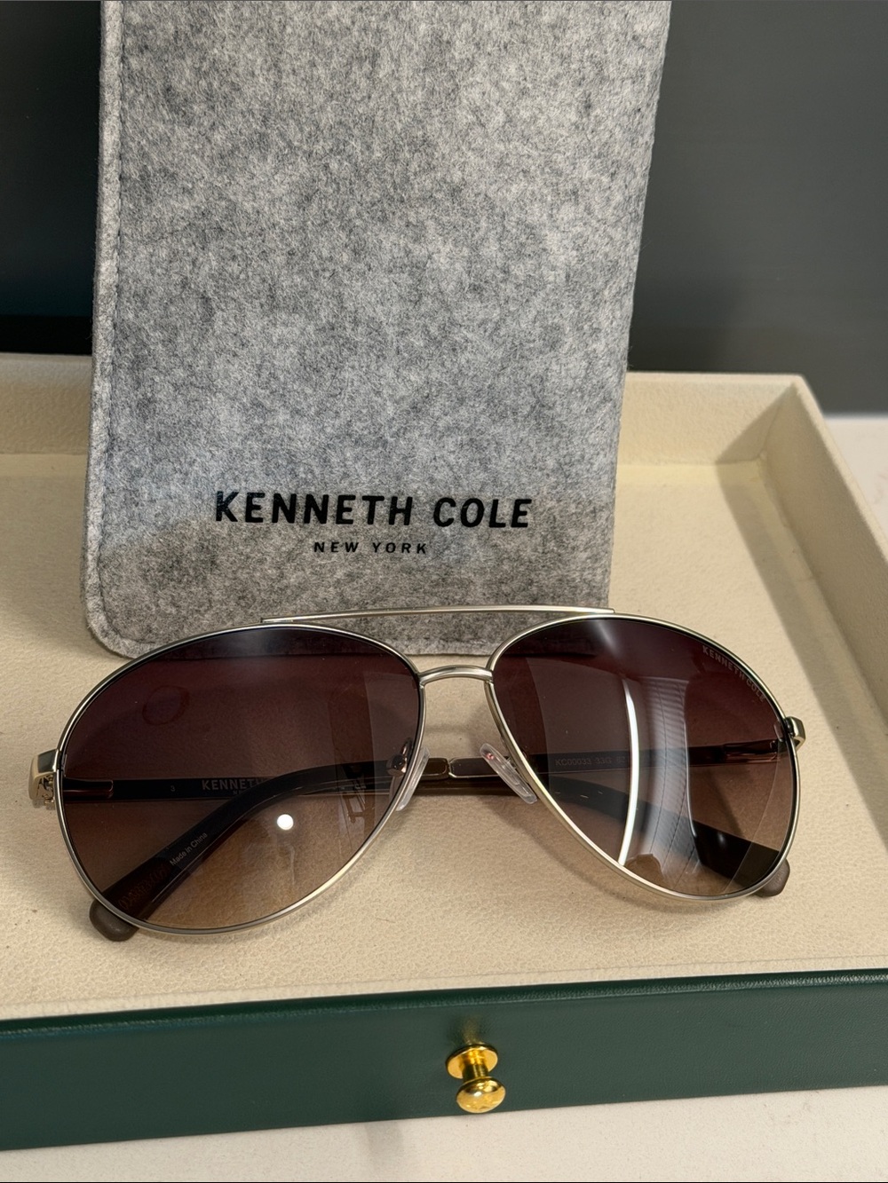 Kenneth Cole Aviators Silver Frame Sunglasses with Brown Gradient Lenses Unisex